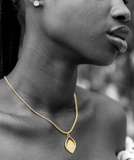 Colgante Arista oro 18k con circonitas